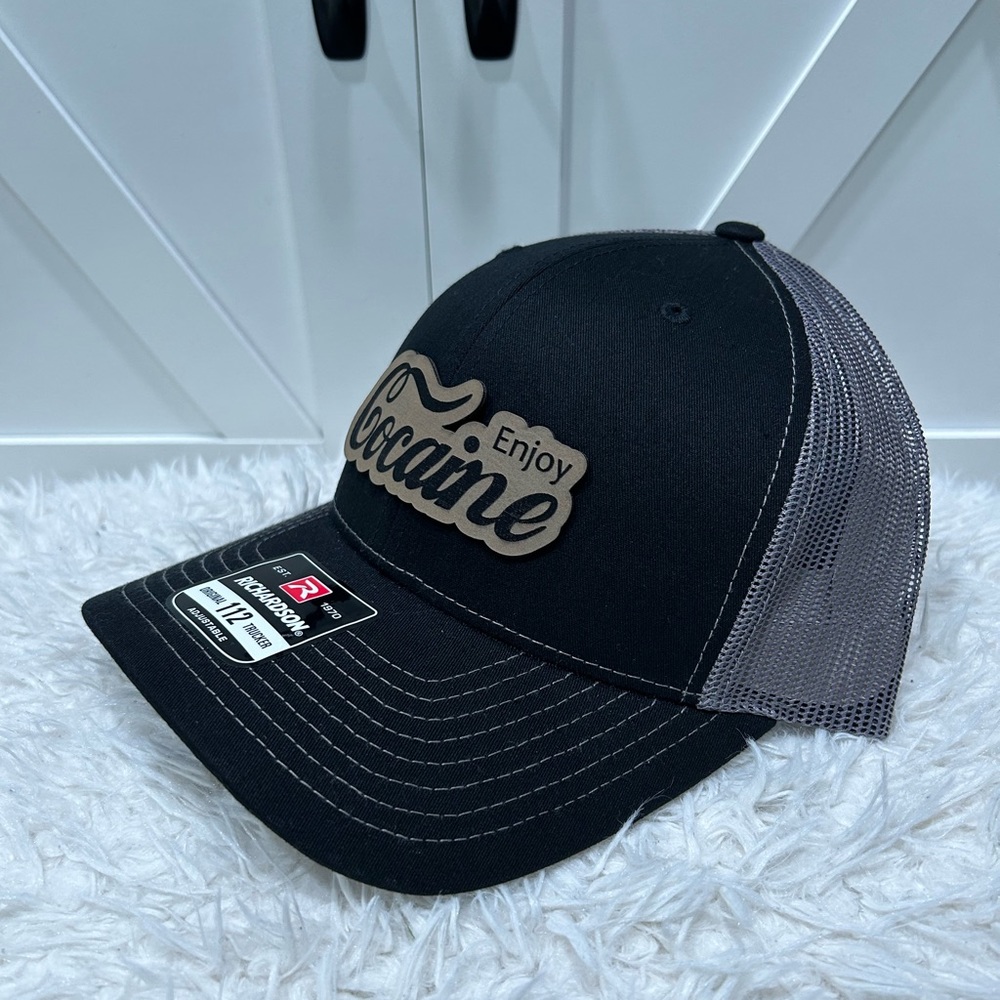 Laser engraved Richardson 112 trucker hat. Enjoy co*caine.
